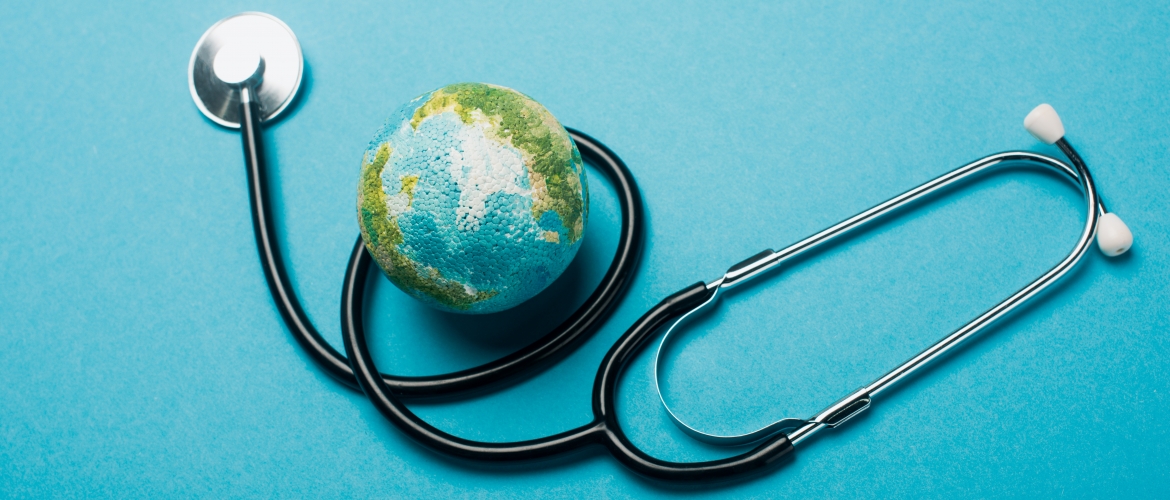 polystyrene ball painted to imitate the Earth with a black stethoscope